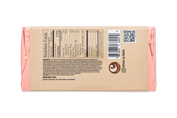 Close-up of a chocolate bar packaging with a pink wrapper and visible nutrition facts 