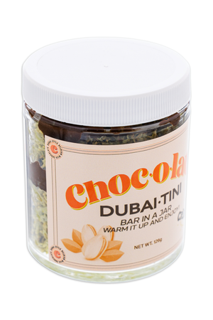 Jar of Choc-o-lata Dubai-Tini with a white lid on a white background