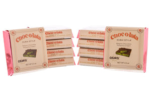 Multiple packages of Chocolata Dubai Style chocolate bars on a white background