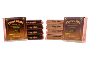 Multiple stacked, arranged packages of Chocolata Dubai Style Crunchy Dark Chocolate Bars on a white background