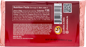 Red chocolate bar packaging with nutrition facts and branding with pink foil wrapper on white background