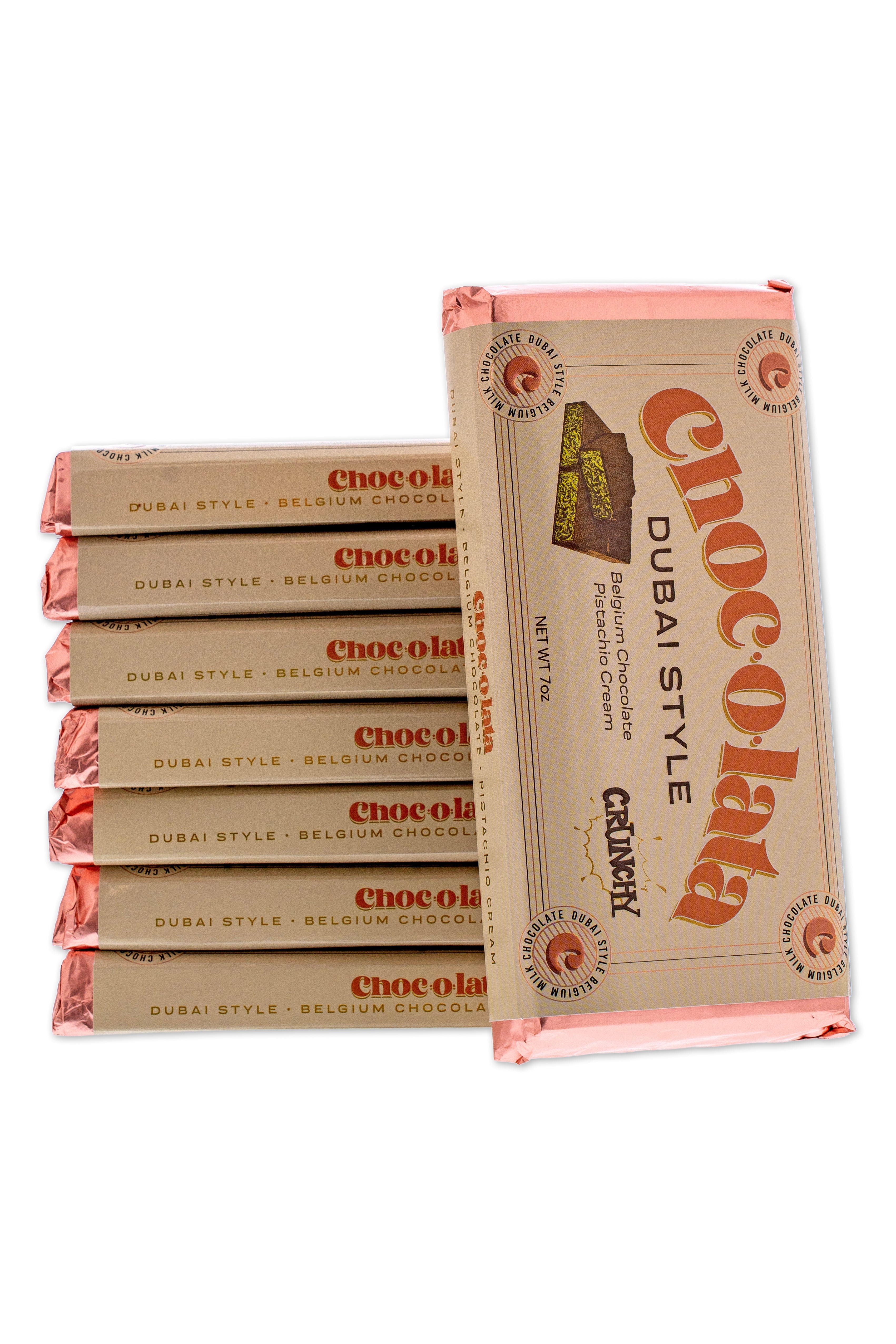 Stack of CHOCOLATA Dubai Style Crunchy Bars with Belgian chocolate and pistachio cream in beige and pink packaging.